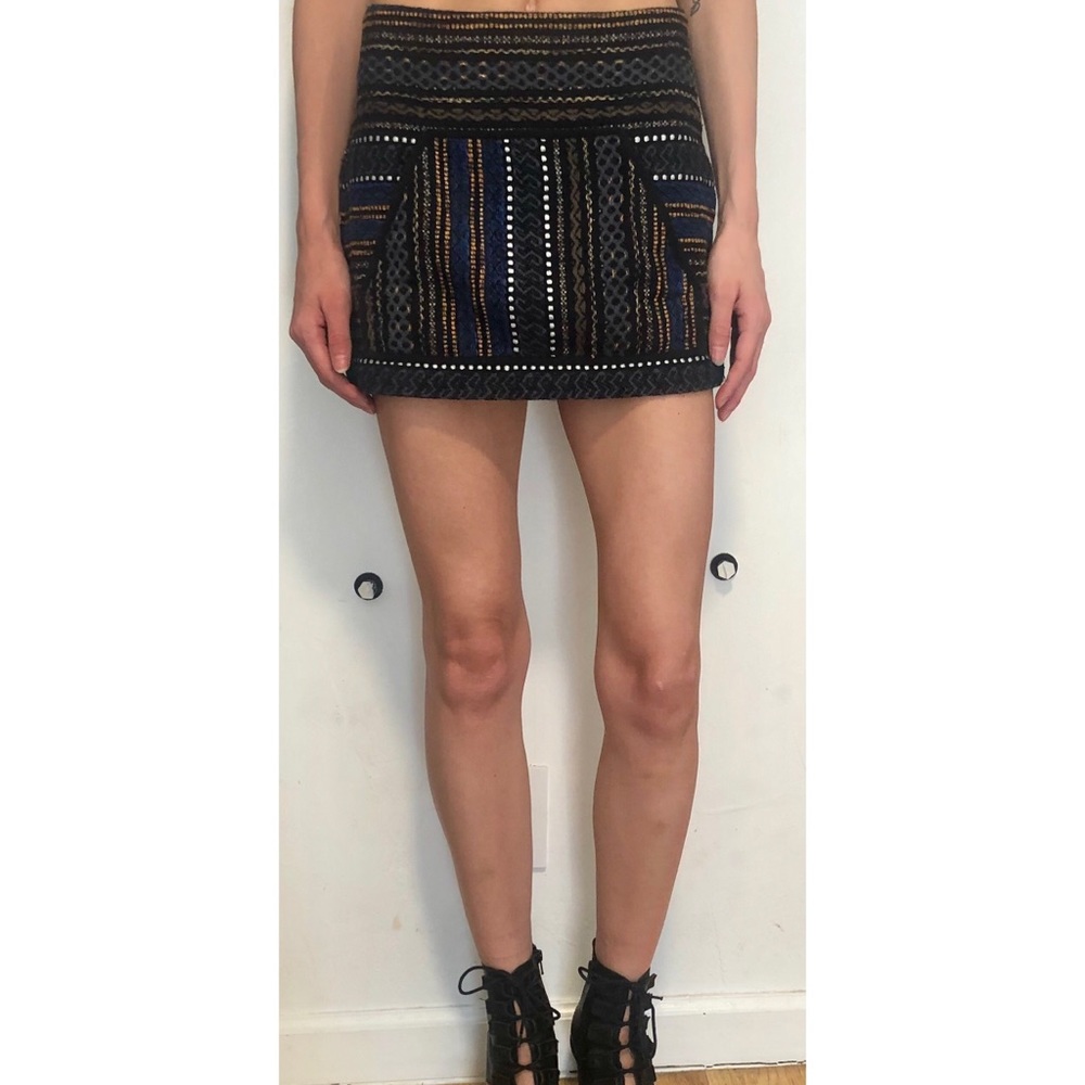 Patterned mini skirt with front pocket
